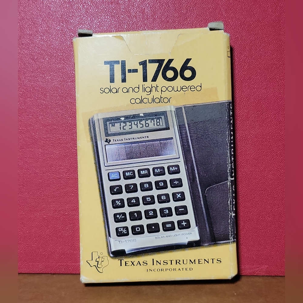 Vintage Texas Instruments TI-1766 Ultra Slim Solar Light Power Calculator W/Case